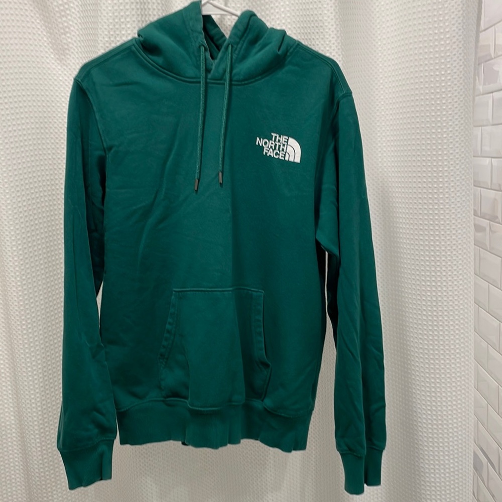 Mens dark green North Face hoodie.